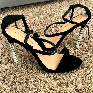 Black elegant with rhinestone heel. Size 8